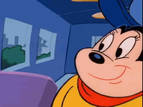 A Cartoon Character Is Smiling In A Room GIF