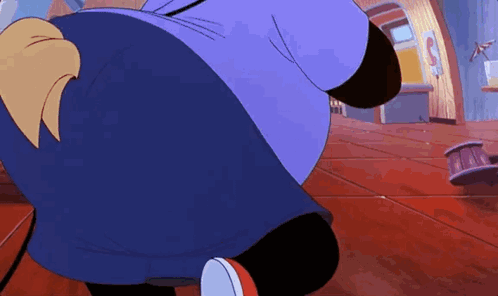 A Cartoon Character Is Standing In A Room With A Purple Shirt On . GIF