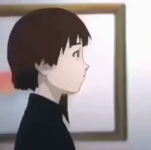A Cartoon Character Is Standing In Front Of A Framed Picture On A Wall . GIF