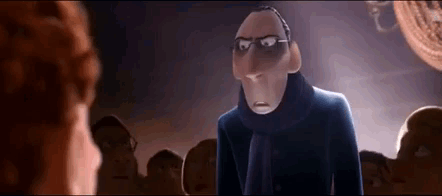 A Cartoon Character Is Standing In Front Of A Group Of People And Looking At Them . GIF