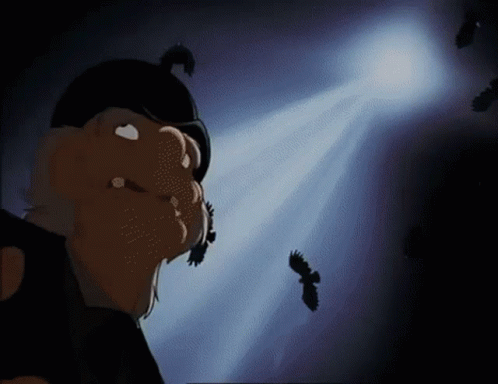 A Cartoon Character Is Standing In Front Of A Spotlight With Birds Flying Around Him GIF