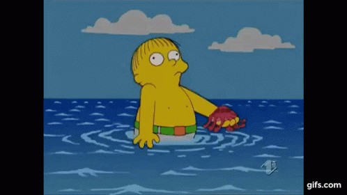 A Cartoon Character Is Standing In The Ocean Holding A Crab In His Hand . GIF