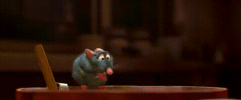 A Cartoon Character Is Standing Next To A Cartoon Character In A Kitchen . GIF