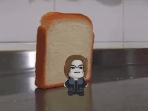 A Cartoon Character Is Standing Next To A Piece Of Bread GIF