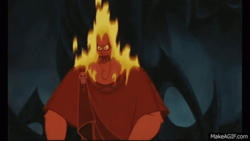 A Cartoon Character Is Surrounded By Flames And Has A Very Angry Look On His Face . GIF
