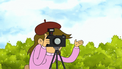 A Cartoon Character Is Taking A Picture With A Camera On A Tripod GIF