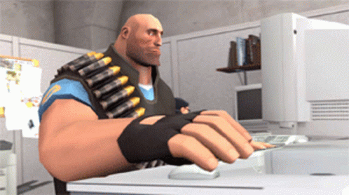 A Cartoon Character Is Typing On A Keyboard In Front Of A Computer Monitor GIF