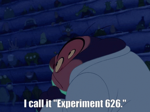 A Cartoon Character Is Under A Glass Dome In Front Of A Crowd Of People GIF