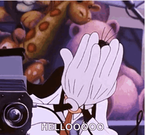 A Cartoon Character Is Waving His Hand In Front Of A Camera While Saying Hello . GIF