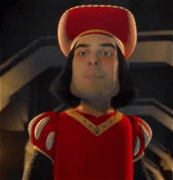 A Cartoon Character Is Wearing A Red Hat And A Red Dress . GIF