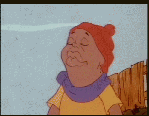 A Cartoon Character Is Wearing A Red Hat And A Scarf GIF