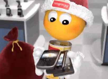 A Cartoon Character Is Wearing A Santa Hat And Holding Two Phones GIF