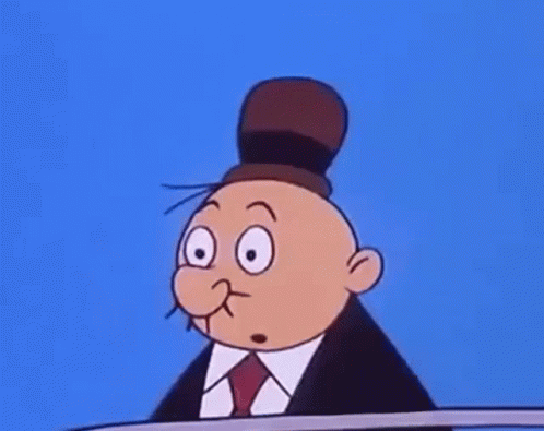 A Cartoon Character Is Wearing A Suit And Tie And Has Two Faces . GIF