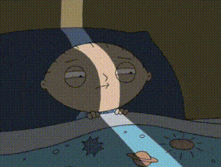 A Cartoon Character Laying In Bed With A Light Coming Out Of His Eyes GIF