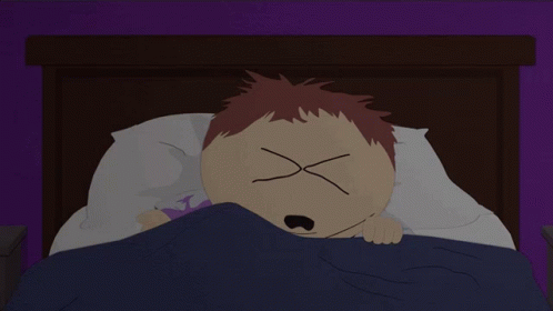 A Cartoon Character Laying In Bed With His Eyes Crossed GIF