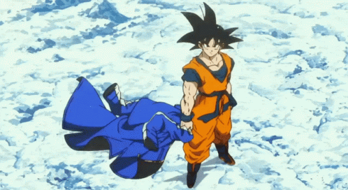 A Cartoon Character Named Goku Is Standing In The Snow Holding A Blue Coat GIF