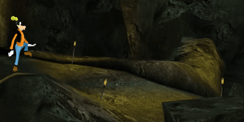 A Cartoon Character Named Goofy Walks Through A Dark Cave GIF