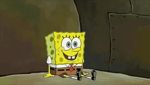 A Cartoon Character Named Spongebob Is Sitting On The Ground Smiling GIF