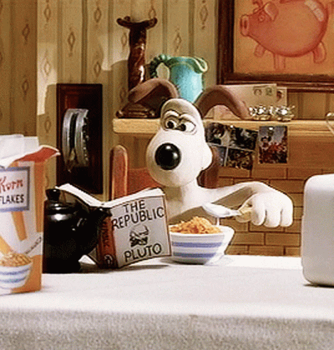 a cartoon character reading a book called the republic pluto