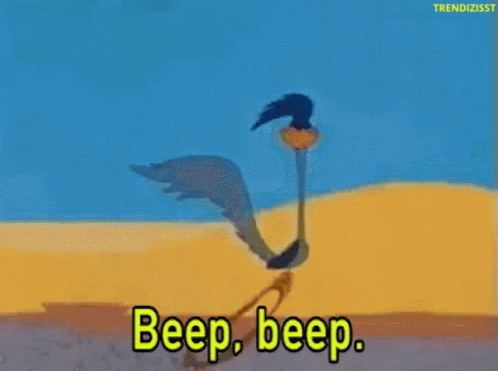 A Cartoon Character Says Beep Beep In A Desert GIF
