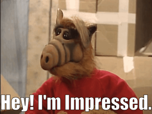 A Cartoon Character Says Hey I 'M Impressed While Wearing A Red Sweater GIF