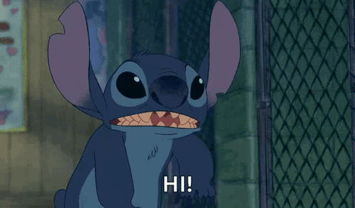 A Cartoon Character Says Hi In A Dark Room GIF
