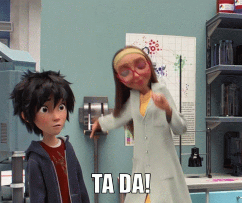A Cartoon Character Says Ta Da In A Lab GIF