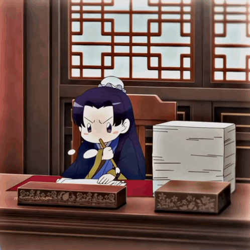 Cartoon Character Sitting At Desk With Papers GIF