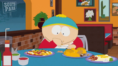 A Cartoon Character Sits At A Table With Plates Of Food And A Sign That Says South Park GIF