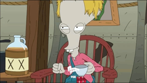 Cartoon Character Sitting Next To XXX Bottle GIF