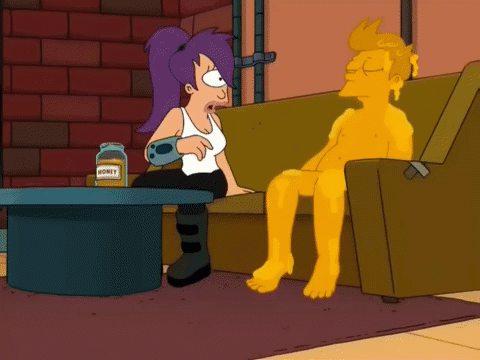 A Cartoon Character Sits On A Couch Next To A Table With A Jar Of Honey On It GIF