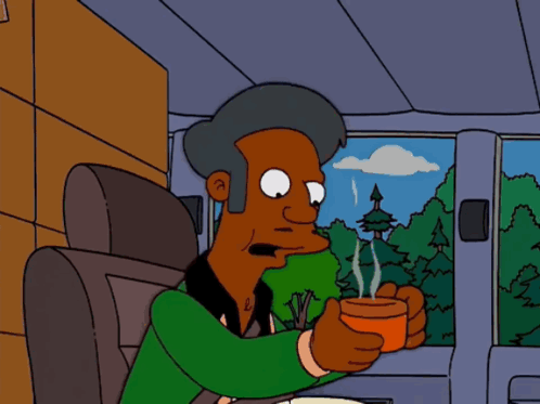A Cartoon Character Sitting In A Car Holding A Cup GIF