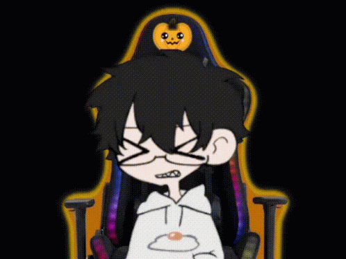 A Cartoon Character Sitting In A Chair With A Pumpkin On His Head GIF