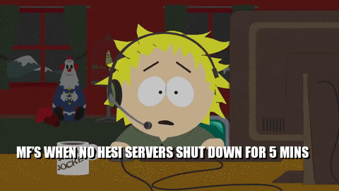 A Cartoon Character Sitting In Front Of A Computer With A Cup Of Socks On The Table GIF