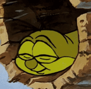 A Cartoon Character Sleeping In A Hole In A Rock GIF