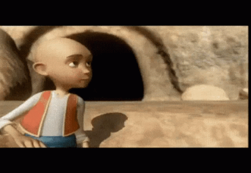 A Cartoon Character Standing In Front Of A Cave GIF