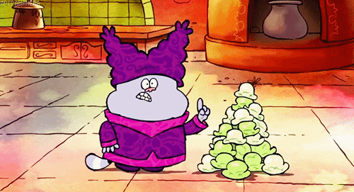 A Cartoon Character Standing Next To A Pile Of Ice Cream Cones GIF