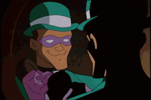 A Cartoon Character Wearing A Green Hat And A Purple Mask With The Letter C On It GIF