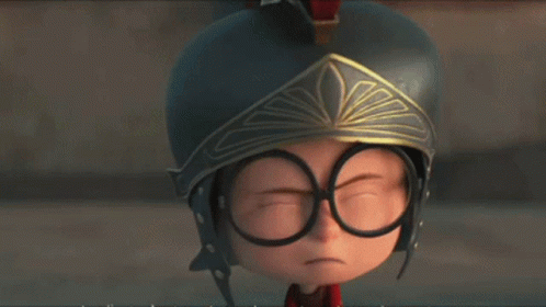 A Cartoon Character Wearing A Helmet And A Crown Looks Sad GIF