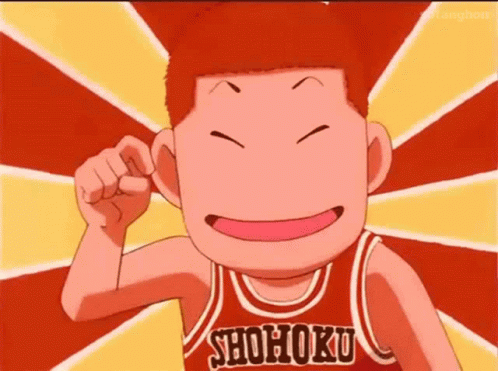 A Cartoon Character Wearing A Shohoku Basketball Jersey Is Smiling . GIF
