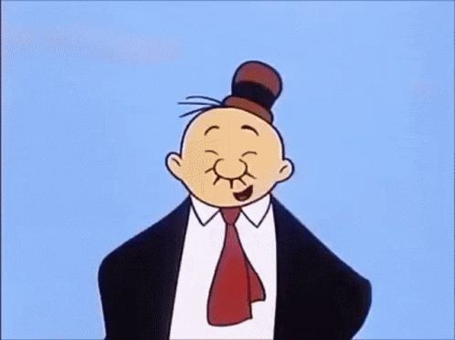 A Cartoon Character Wearing A Suit And Tie Is Making A Face . GIF