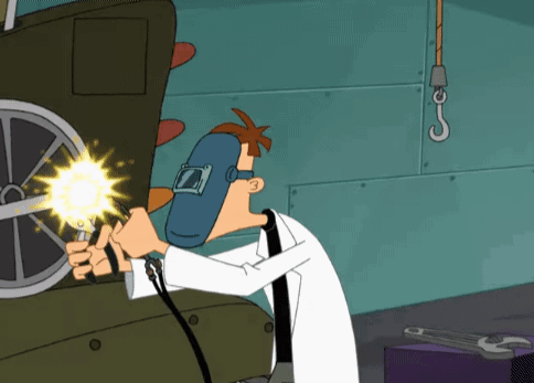 A Cartoon Character Wearing A Welding Mask Is Welding A Wheel GIF