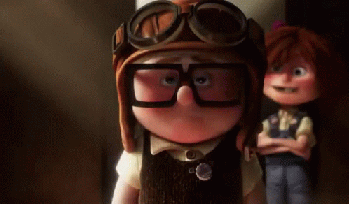 A Cartoon Character Wearing Glasses And A Helmet Is Standing Next To Another Cartoon Character . GIF