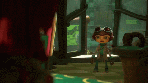 A Cartoon Character Wearing Goggles Is Standing In Front Of A Sign That Says Studio GIF