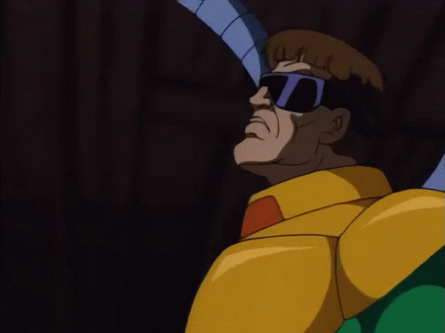 A Cartoon Character Wearing Sunglasses And A Yellow And Green Suit GIF