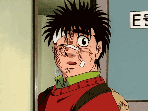 A Cartoon Character With A Bandage On His Face Stands In Front Of A Sign That Says E. GIF