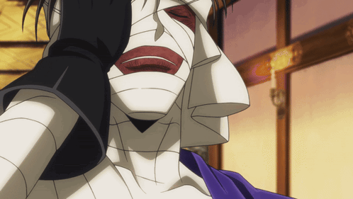 A Cartoon Character With A Bandaged Face And A Black Glove GIF