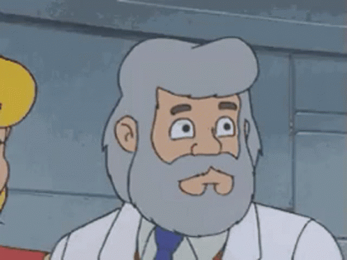 A Cartoon Character With A Beard And A White Coat Is Looking At The Camera . GIF