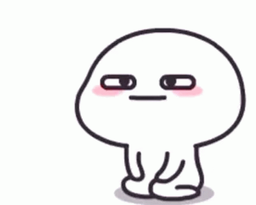 A Cartoon Character With A Big Head And A Small Body Is Sitting Down And Making A Funny Face . GIF