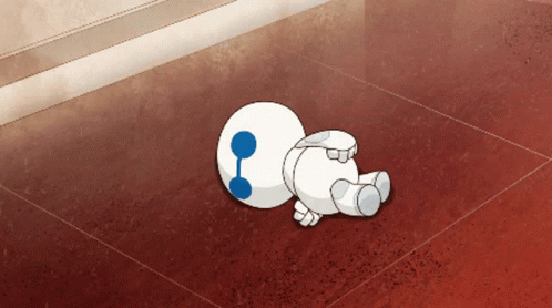 A Cartoon Character With A Blue Eye Is Laying On The Ground GIF